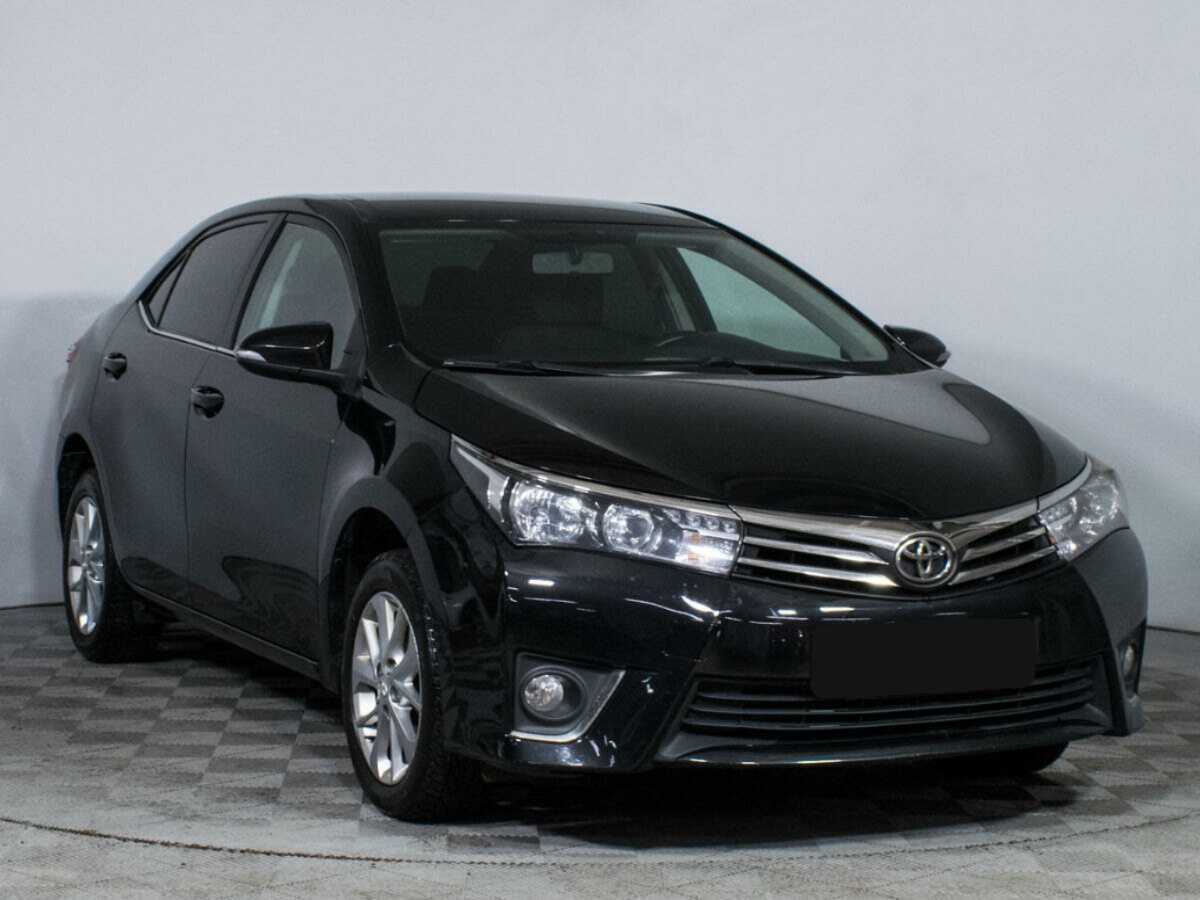 Toyota Corolla 2013 года с пробегом. Фото: #2