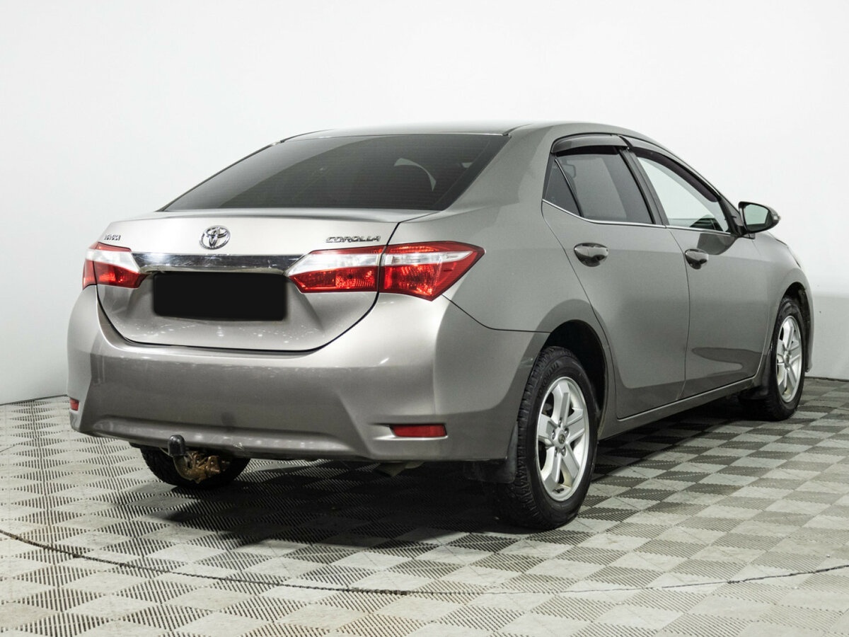 Toyota Corolla 2014 года с пробегом. Фото: #4