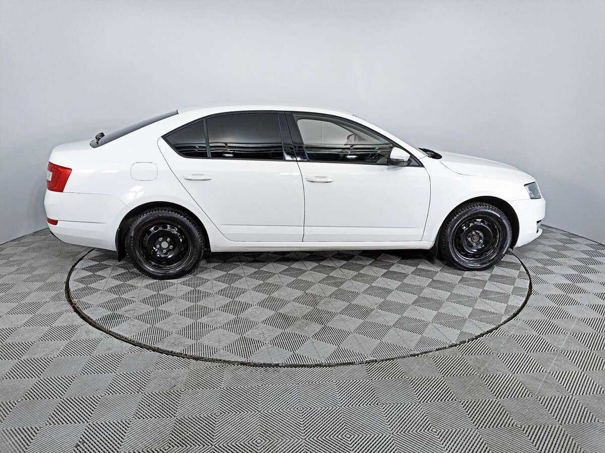 Skoda Octavia 2014 года с пробегом. Фото: #3