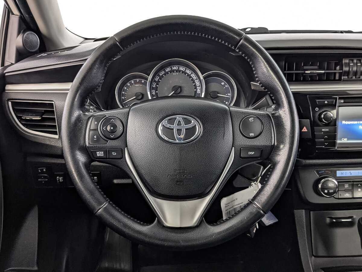 Toyota Corolla 2014 года с пробегом. Фото: #19