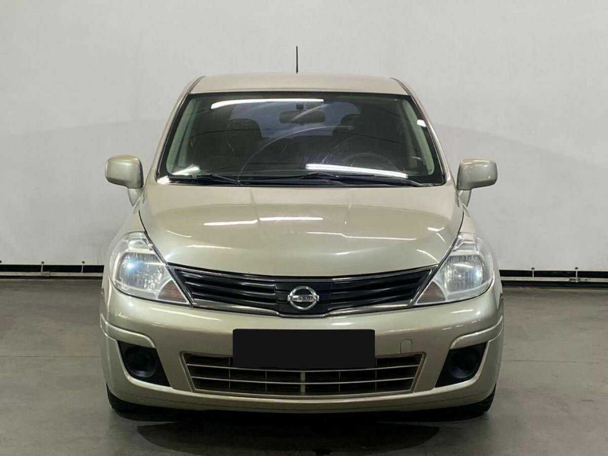 Nissan Tiida 2013 года с пробегом. Фото: #1