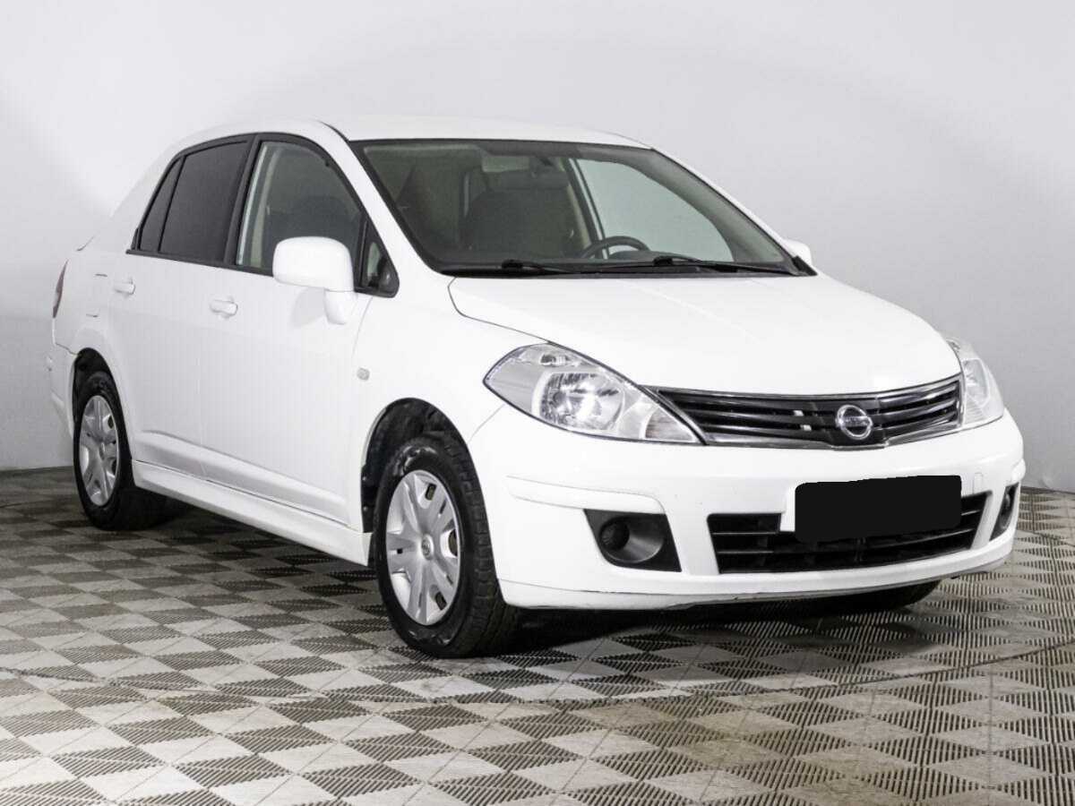 Nissan Tiida 2013 года с пробегом. Фото: #2