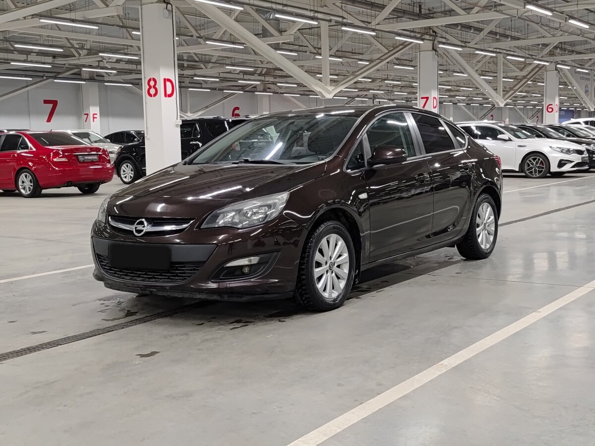 Opel Astra 2014 года с пробегом. Посмотреть фото