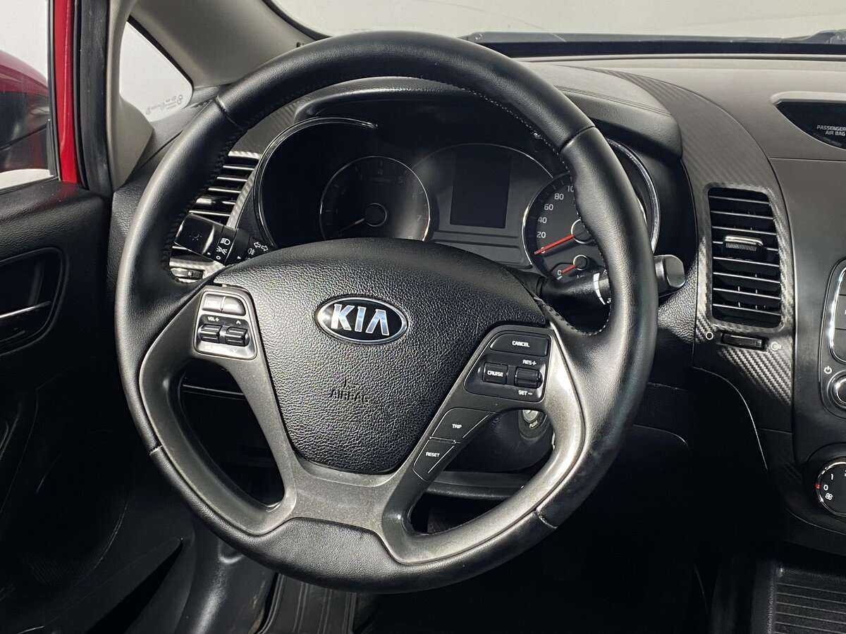 Kia Cerato 2013 года с пробегом. Фото: #9