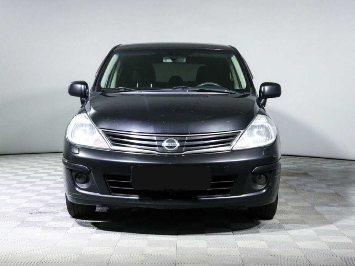Nissan Tiida 2013 года с пробегом. Фото: #1