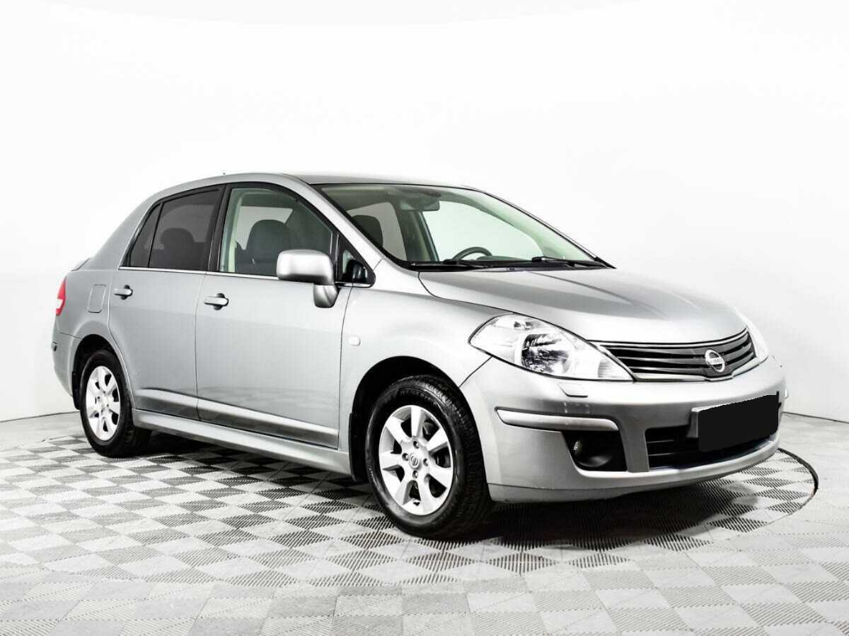 Nissan Tiida 2013 года с пробегом. Фото: #2
