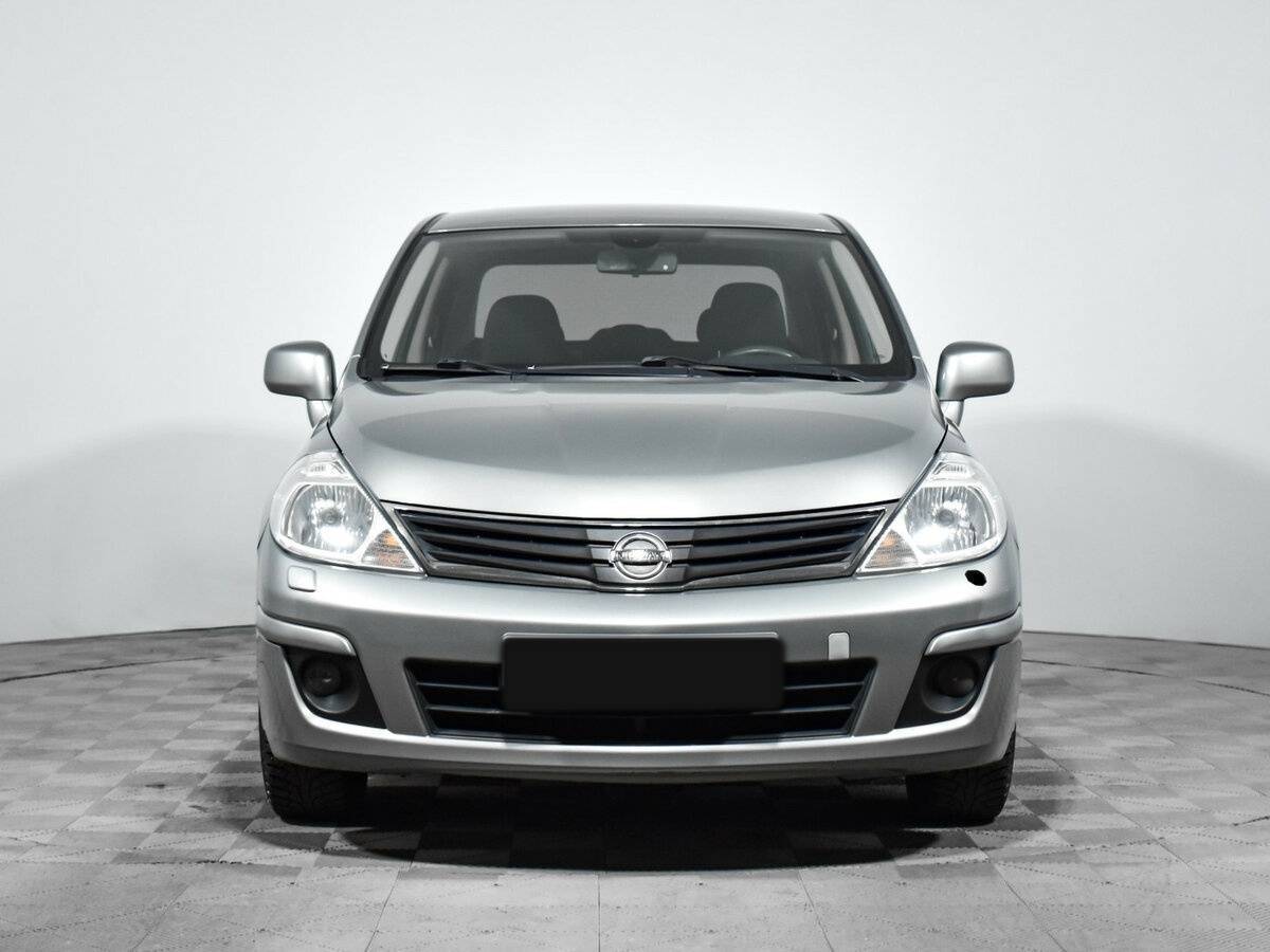 Nissan Tiida 2013 года с пробегом. Фото: #1