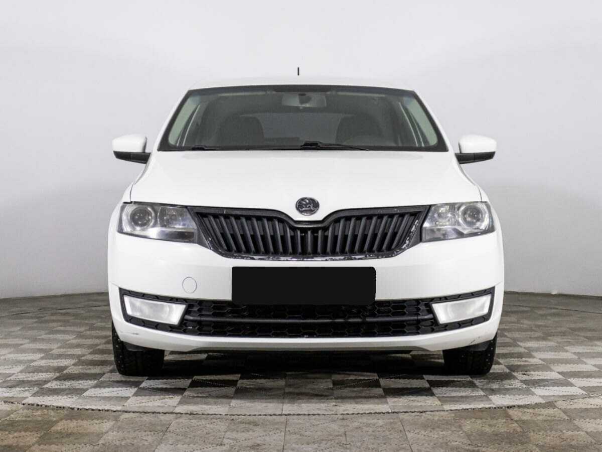 Skoda Rapid 2014 года с пробегом. Посмотреть фото