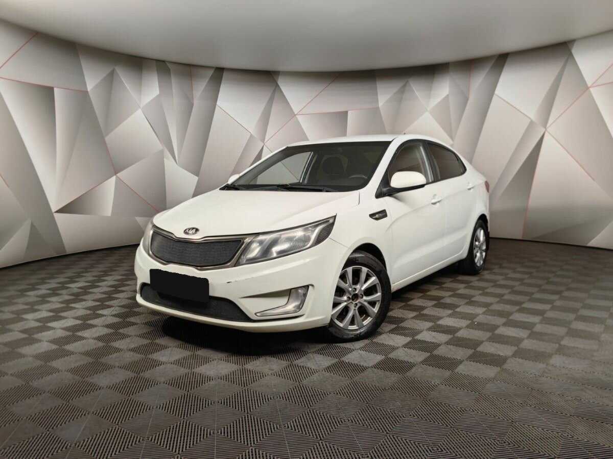 Kia Rio 2013 года с пробегом. Посмотреть фото