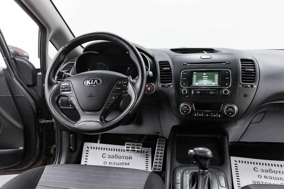 Kia Cerato 2013 года с пробегом. Фото: #8