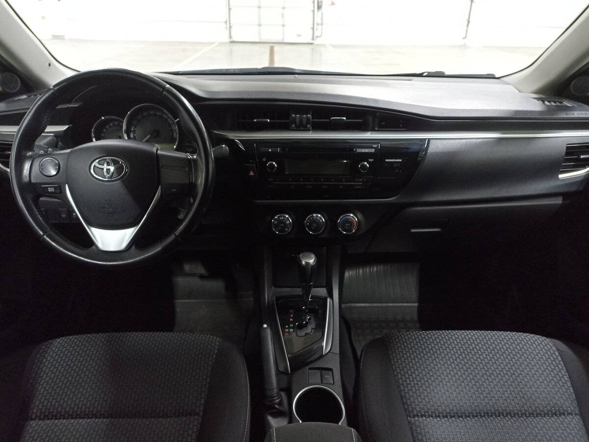 Toyota Corolla 2013 года с пробегом. Фото: #13