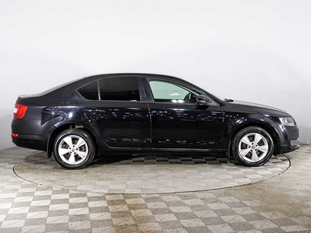 Skoda Octavia 2014 года с пробегом. Фото: #3