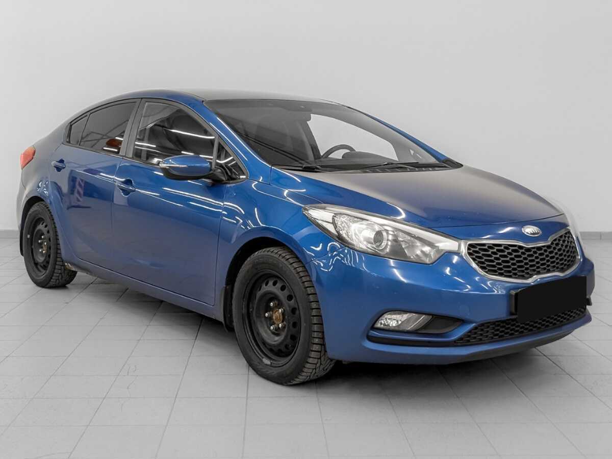 Kia Cerato 2013 года с пробегом. Фото: #2