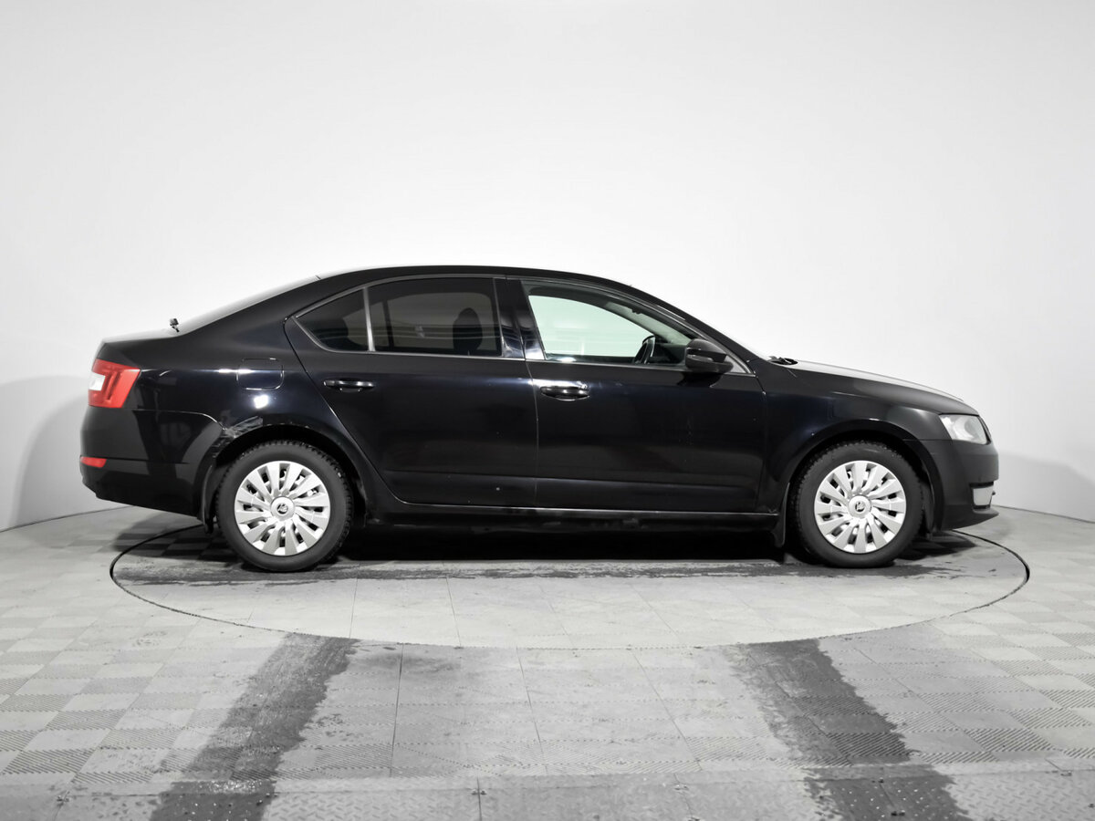 Skoda Octavia 2014 года с пробегом. Фото: #3
