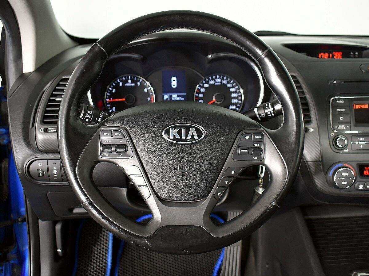 Kia Cerato 2013 года с пробегом. Фото: #10