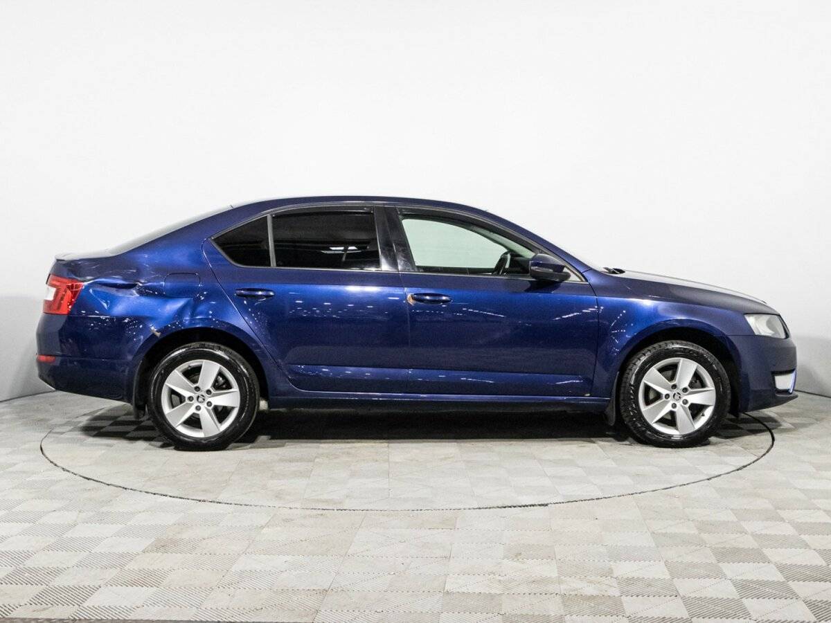 Skoda Octavia 2013 года с пробегом. Фото: #3