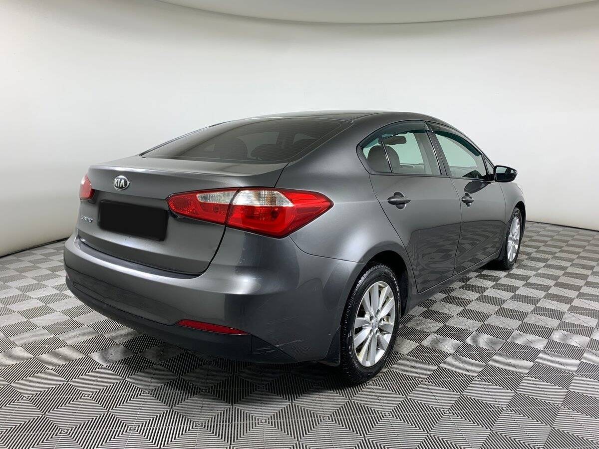 Kia Cerato 2013 года с пробегом. Фото: #4