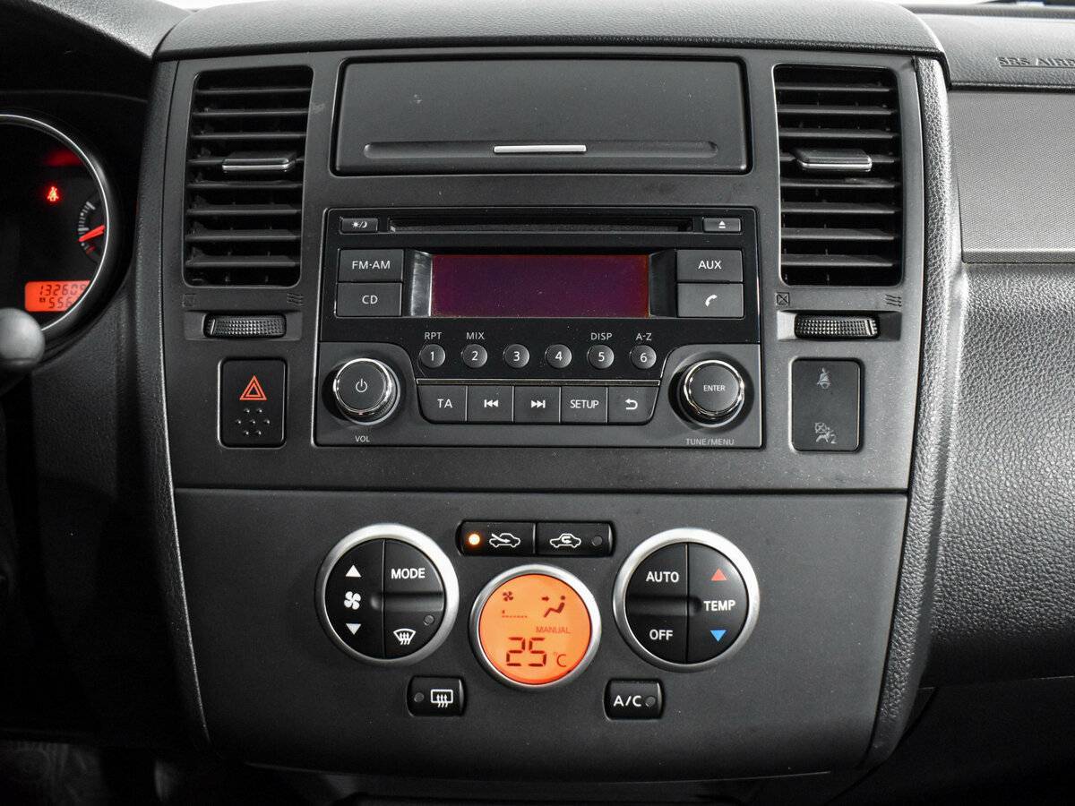 Nissan Tiida 2013 года с пробегом. Фото: #13