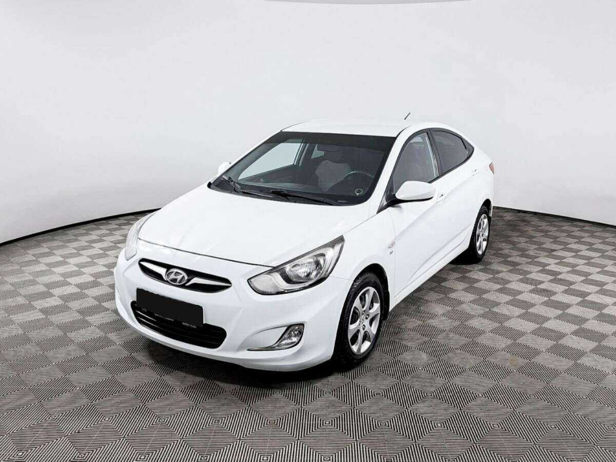 Hyundai Solaris 2013 года с пробегом. Посмотреть фото