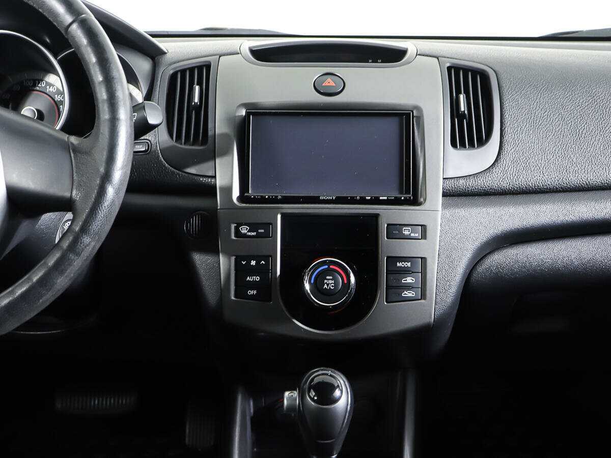 Kia Cerato 2012 года с пробегом. Фото: #13