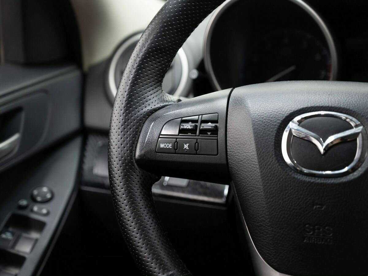 Mazda 3 2011 года с пробегом. Фото: #12