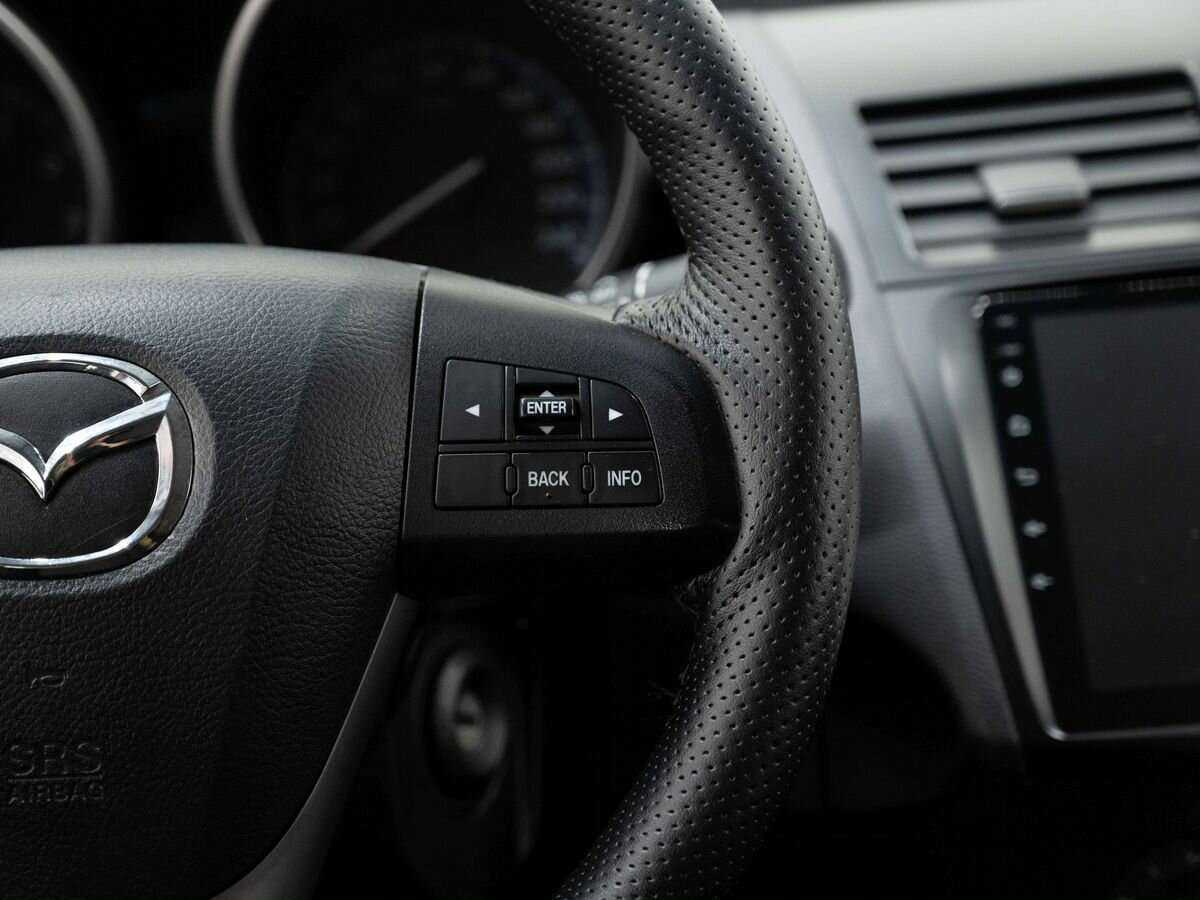 Mazda 3 2011 года с пробегом. Фото: #13