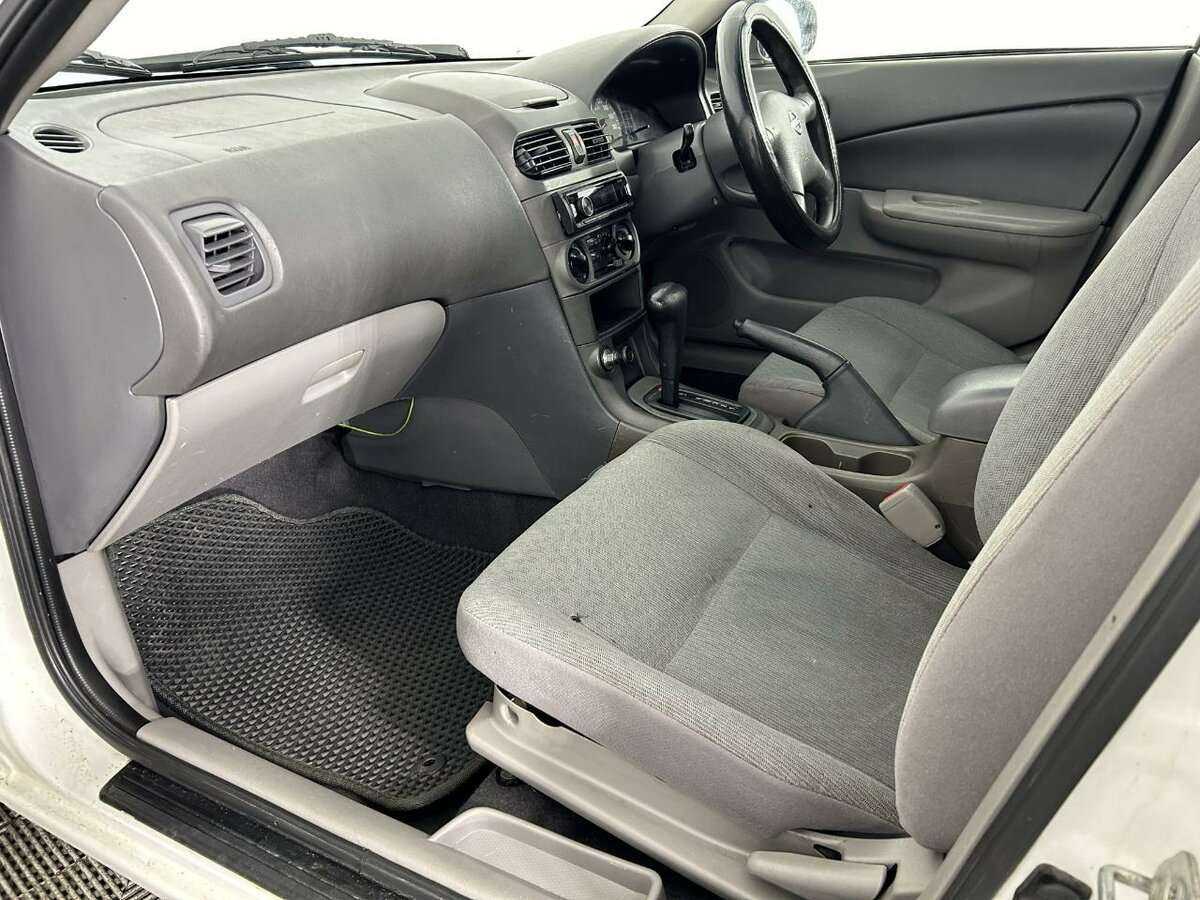 Nissan Sunny 2004 года с пробегом. Фото: #13