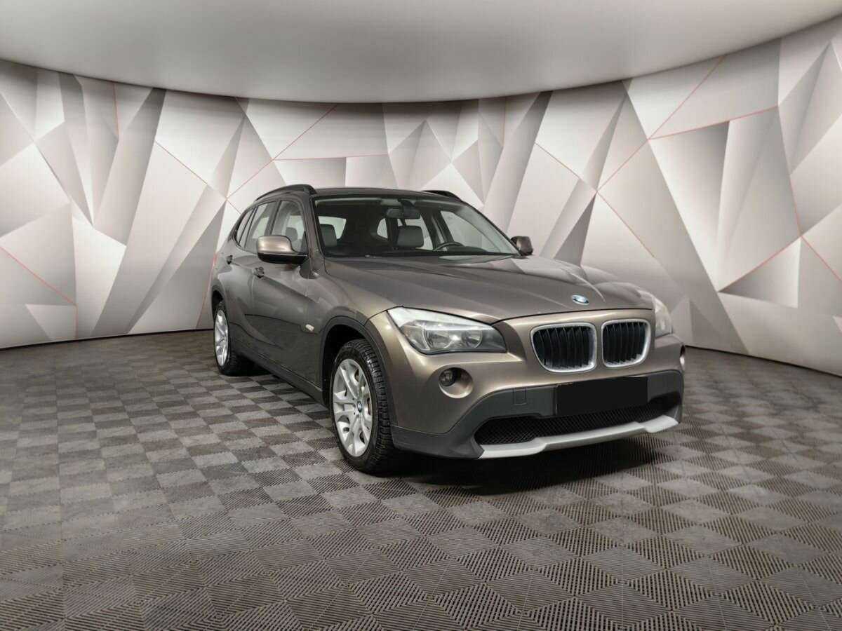 BMW X1 2011 года с пробегом. Фото: #2