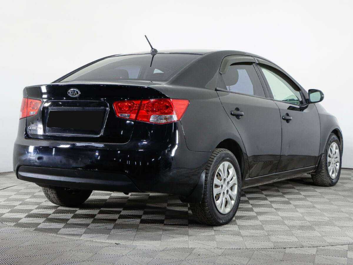 Kia Cerato 2011 года с пробегом. Фото: #4