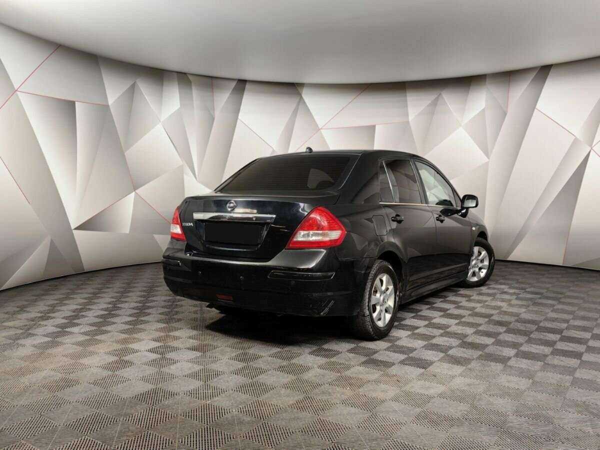 Nissan Tiida 2010 года с пробегом. Фото: #1