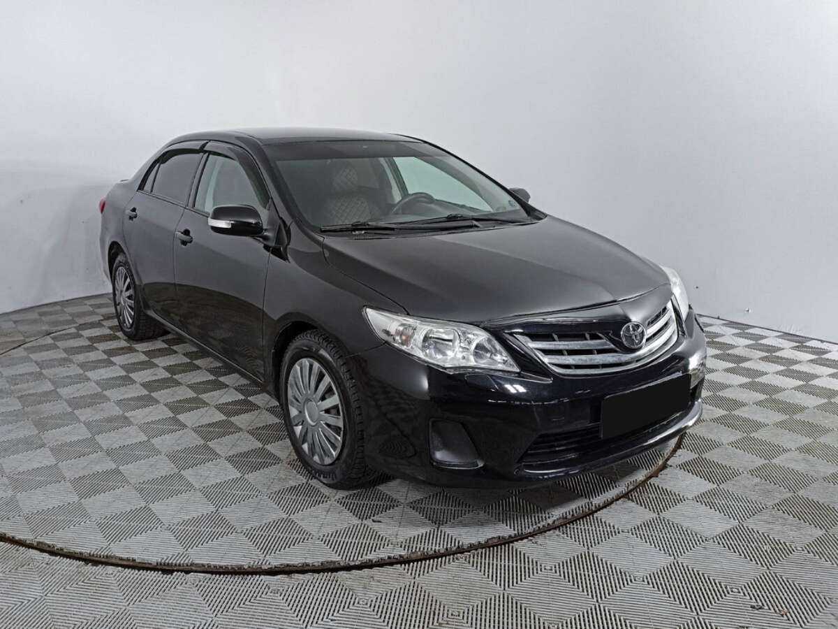 Toyota Corolla 2010 года с пробегом. Фото: #2