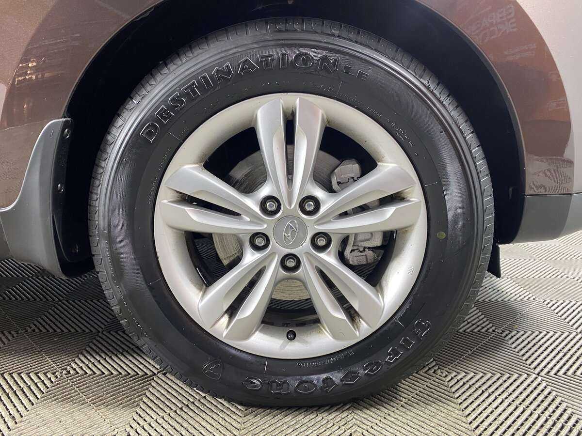 Hyundai ix35 2010 года с пробегом. Фото: #17