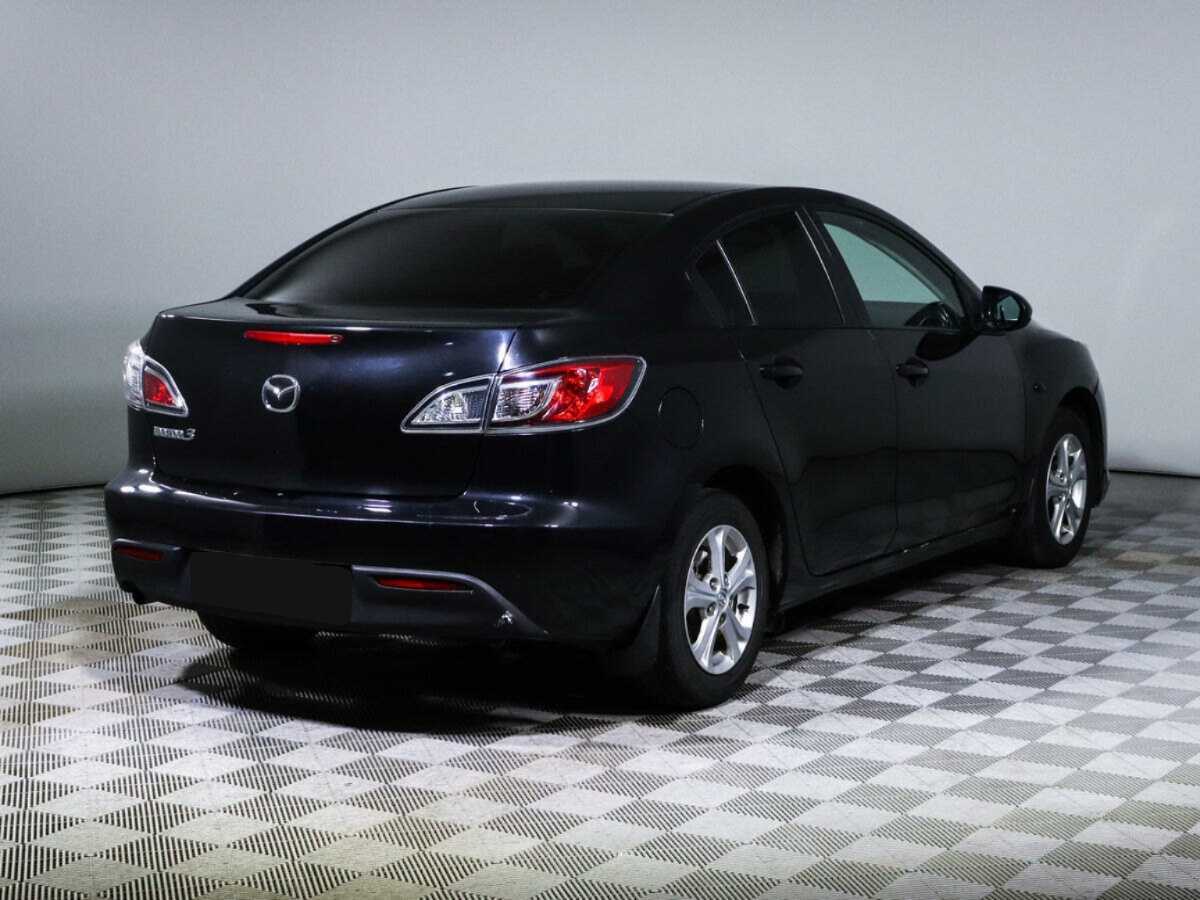 Mazda 3 2011 года с пробегом. Фото: #4
