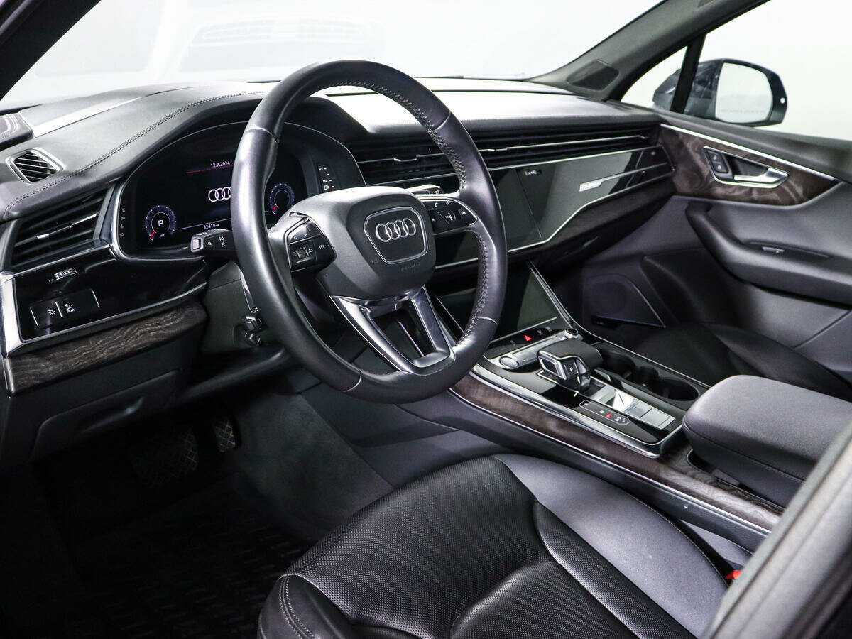 Audi Q7 2019 года с пробегом. Фото: #14