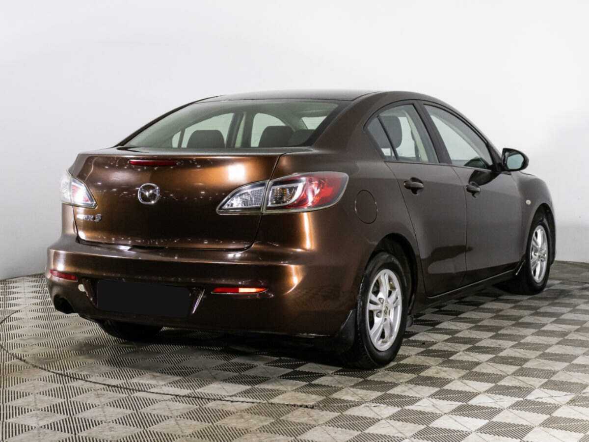 Mazda 3 2011 года с пробегом. Фото: #4