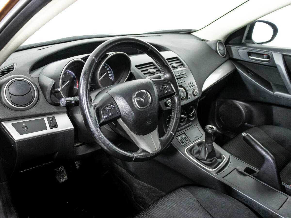 Mazda 3 2011 года с пробегом. Фото: #10