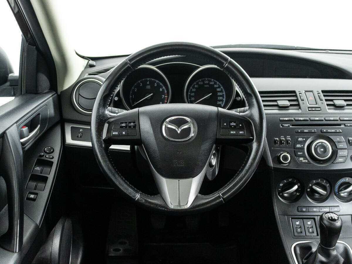 Mazda 3 2011 года с пробегом. Фото: #15