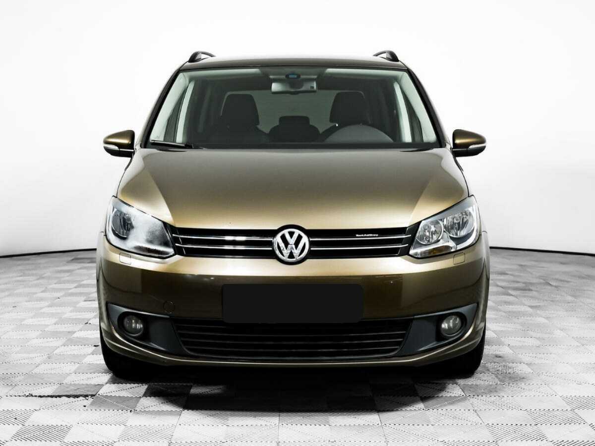 Volkswagen Touran 2013 года с пробегом. Фото: #1