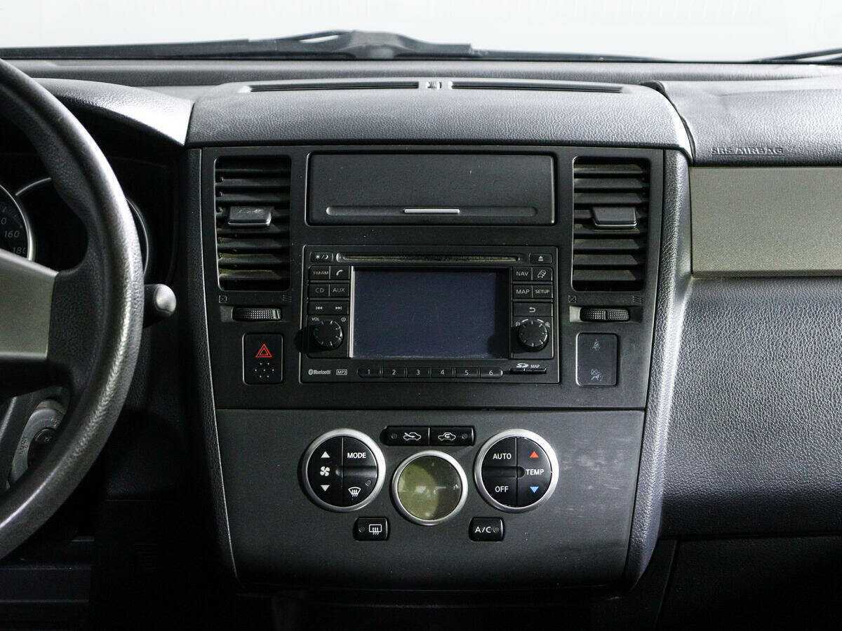 Nissan Tiida 2011 года с пробегом. Фото: #12