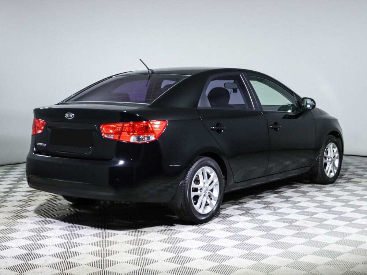 Kia Cerato 2011 года с пробегом. Фото: #4