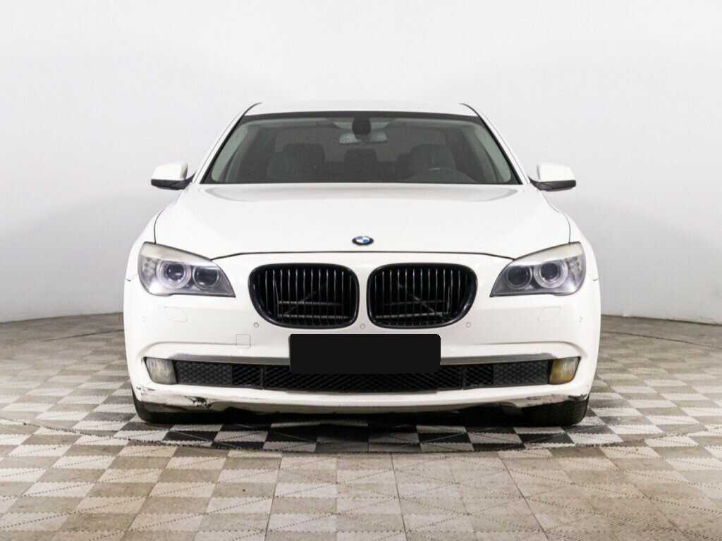 BMW 7 серии 2012 года с пробегом. Фото: #1