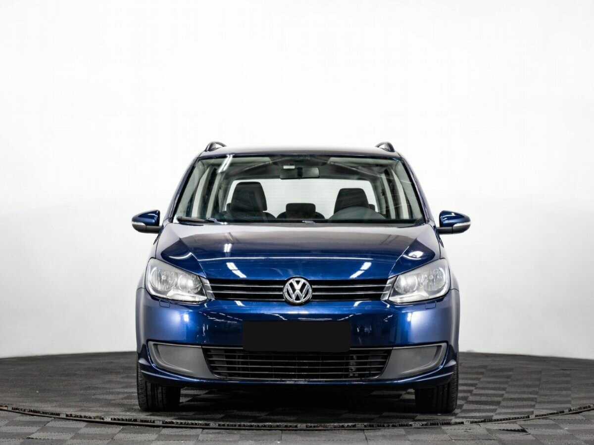 Volkswagen Touran 2012 года с пробегом. Фото: #1