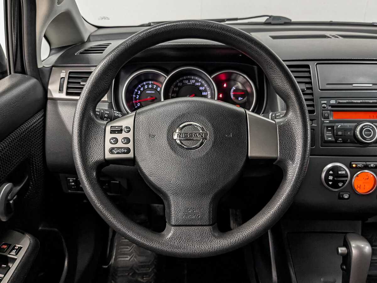 Nissan Tiida 2010 года с пробегом. Фото: #20