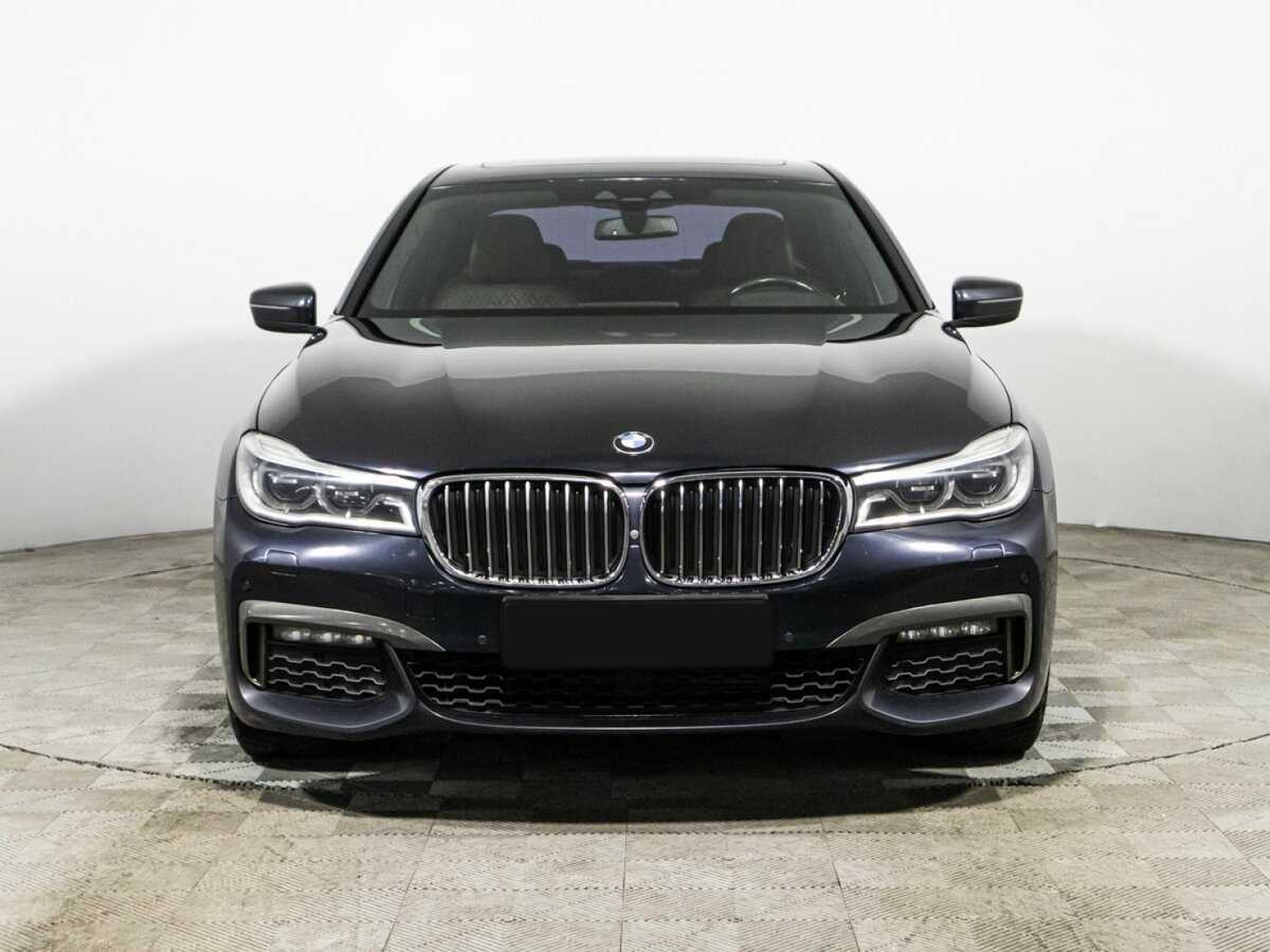 BMW 7 серии 2018 года с пробегом. Фото: #1