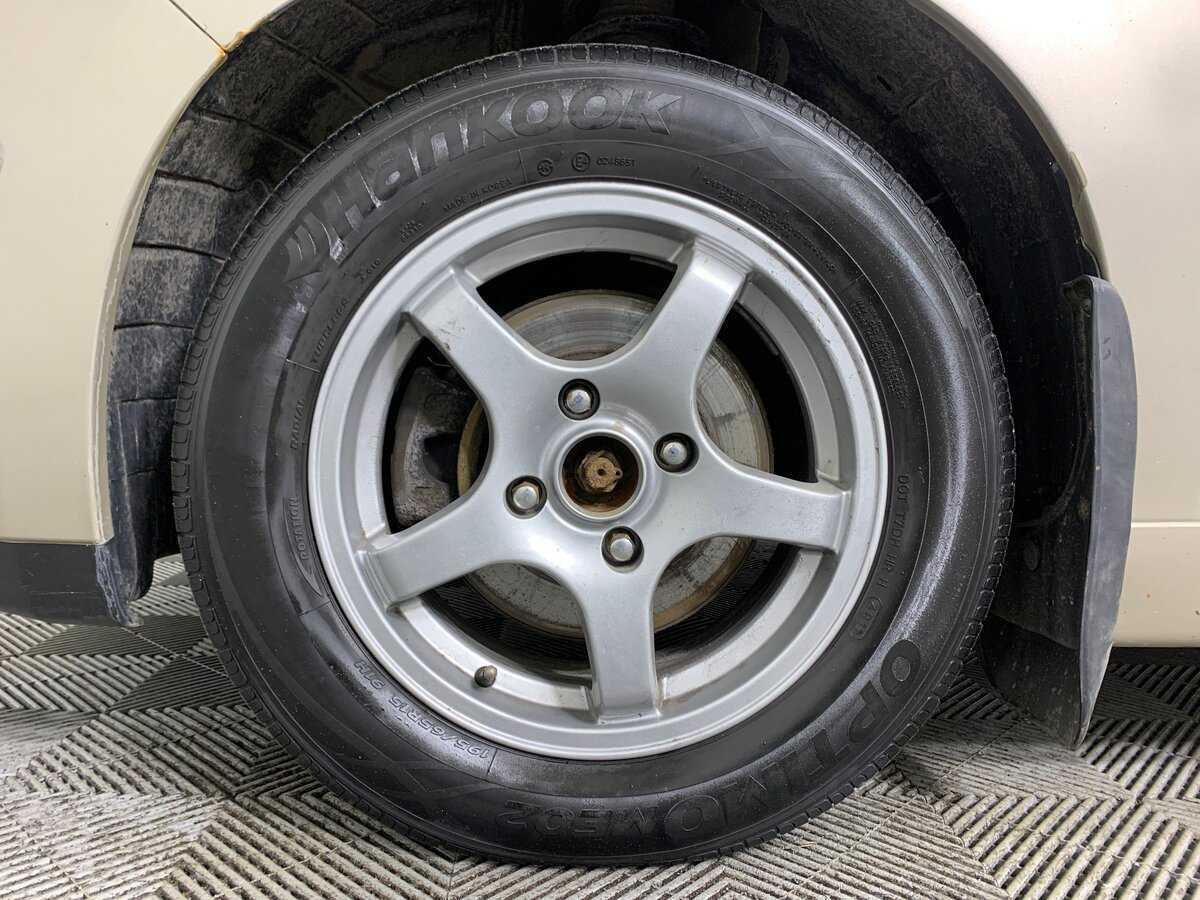 Nissan Tiida 2010 года с пробегом. Фото: #9