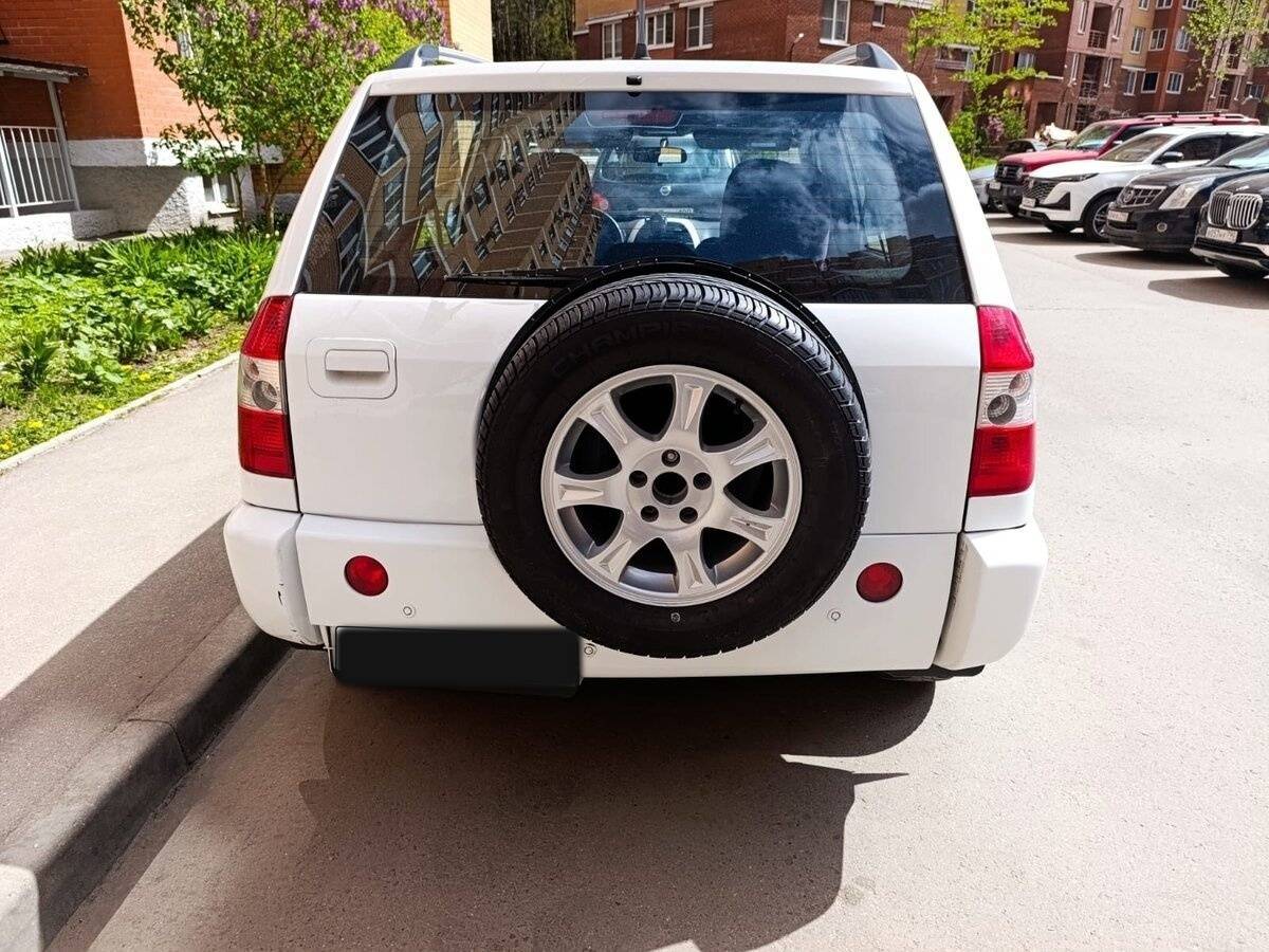 Chery Tiggo (T11) 2012 года с пробегом. Фото: #2