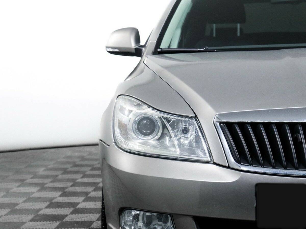 Б/У Шкода Октавия 2012 года. Фото: #14