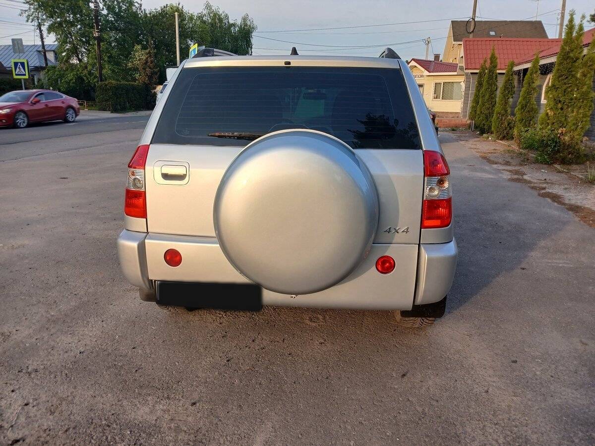 Chery Tiggo (T11) 2013 года с пробегом. Фото: #4