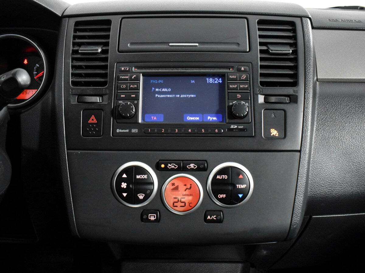 Nissan Tiida 2010 года с пробегом. Фото: #13