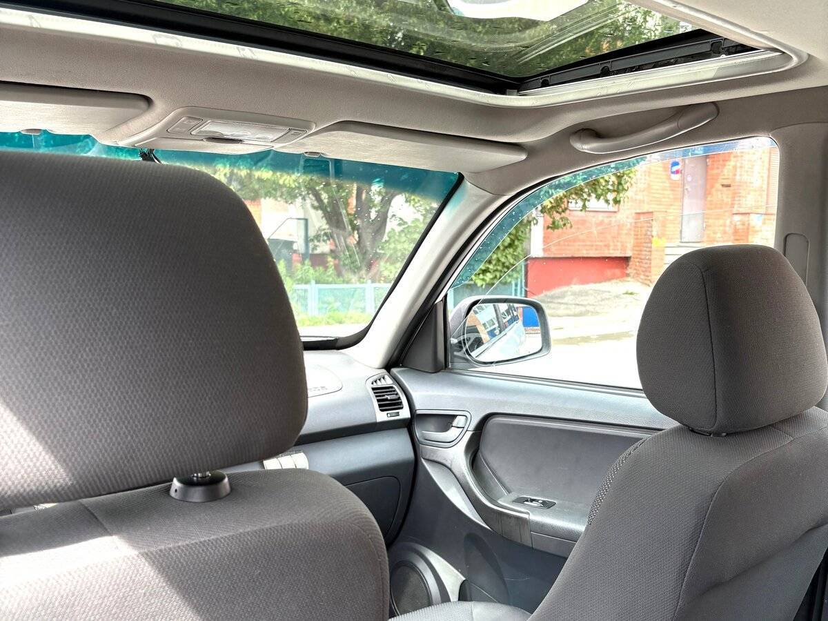 Chery Tiggo (T11) 2013 года с пробегом. Фото: #8